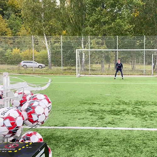 A-Champs football cannon taking shots on a goalkeeper