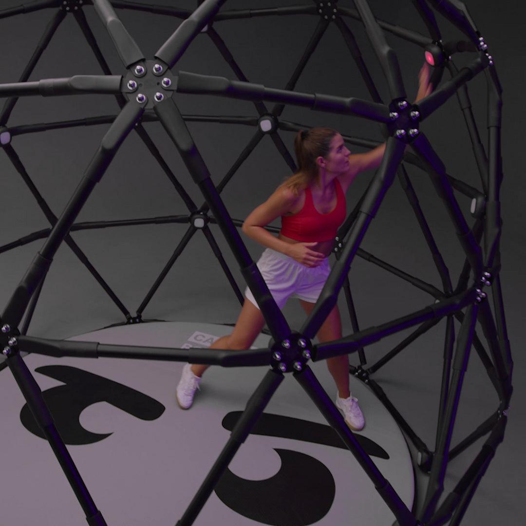 Young woman using the CogniCage to train