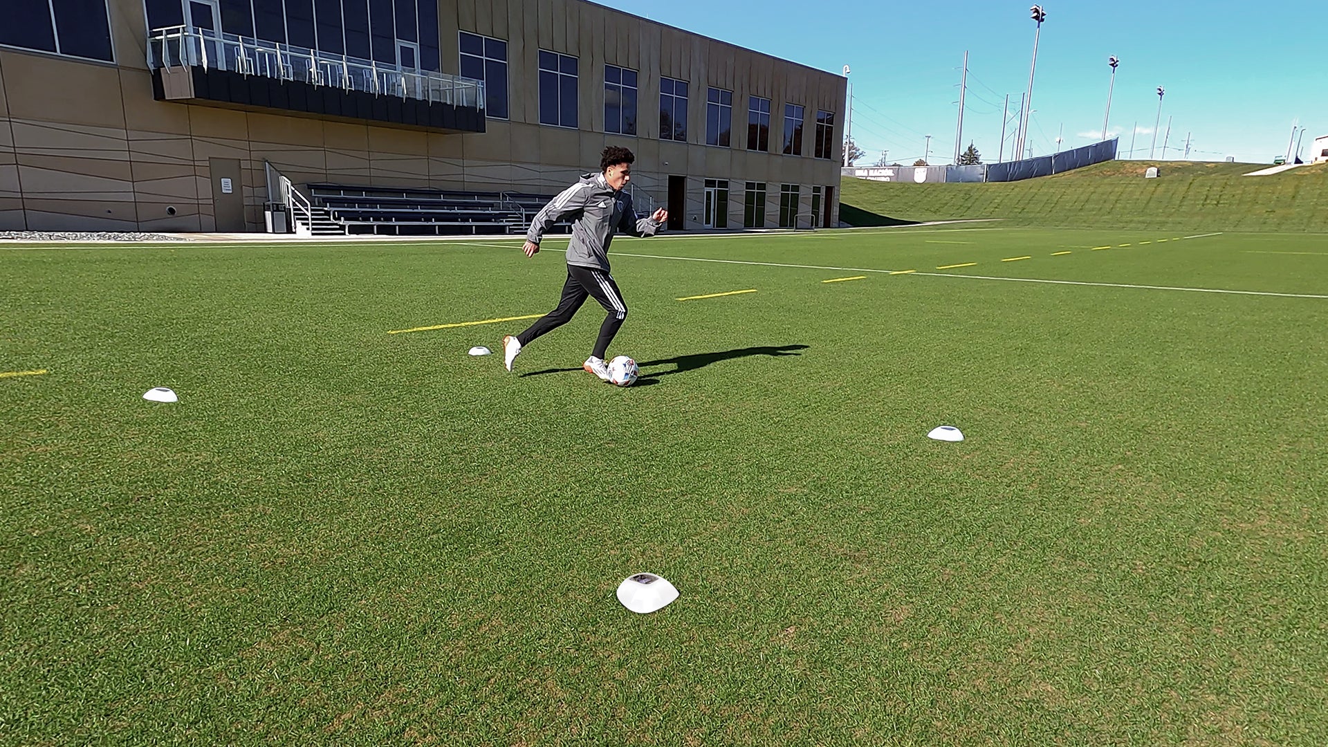 Soccer player using the ROXCone during a training session