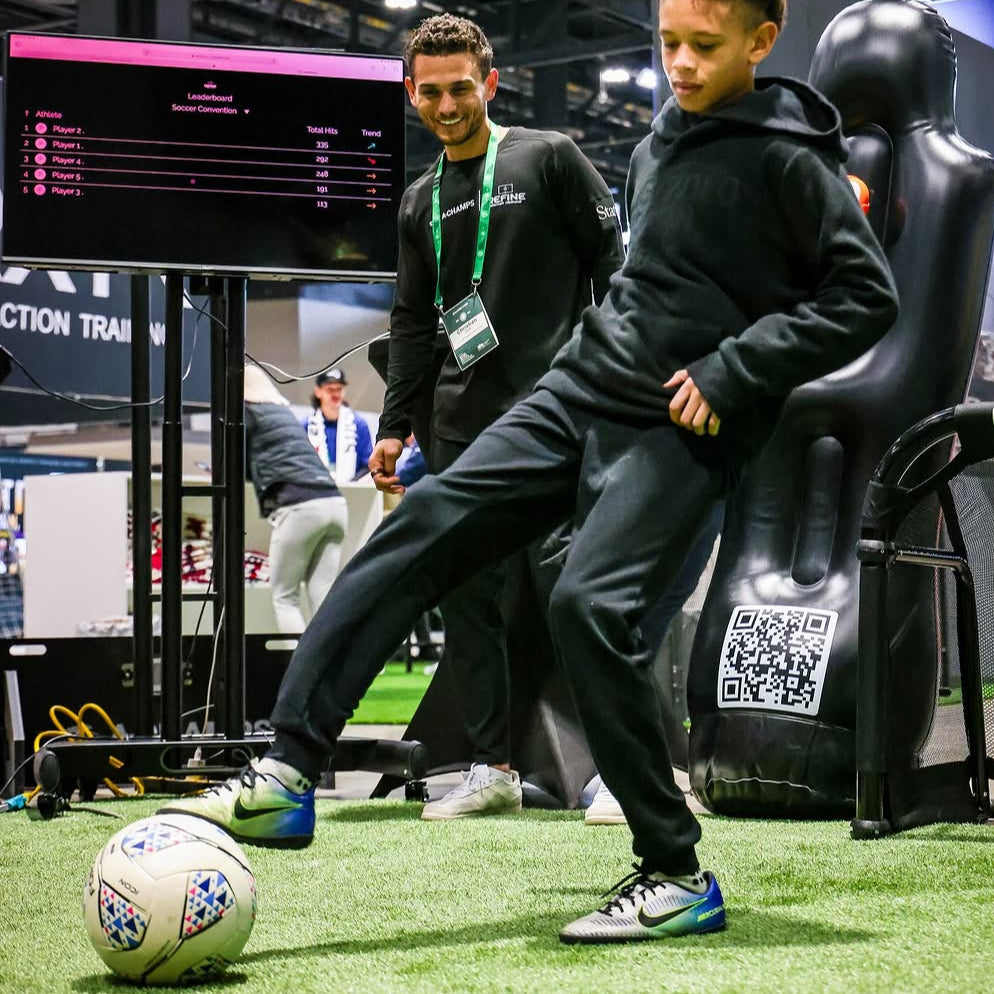 Soccer players using the ROX Scanner and Dummy from A-Champs to train