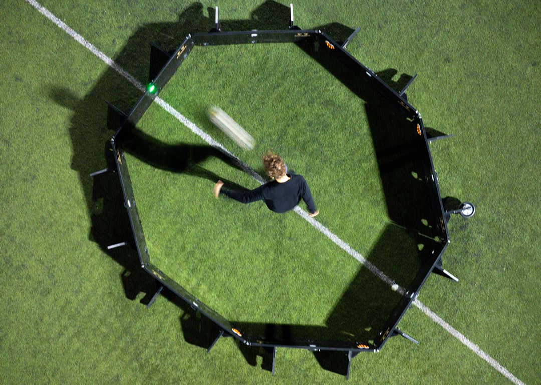 Soccer player using the Rebounder Bundle from A-Champs to train