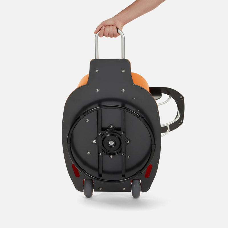 The portable ball launcher with wheels and handle for easy movement